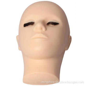 Hand-painted mannequin head with eyelashes training